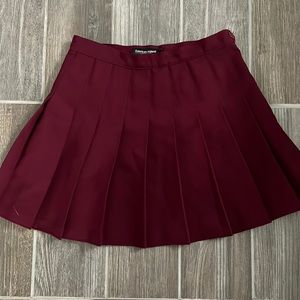 American Apparel burgundy pleated skirt- size large- runs small- fits like a 4